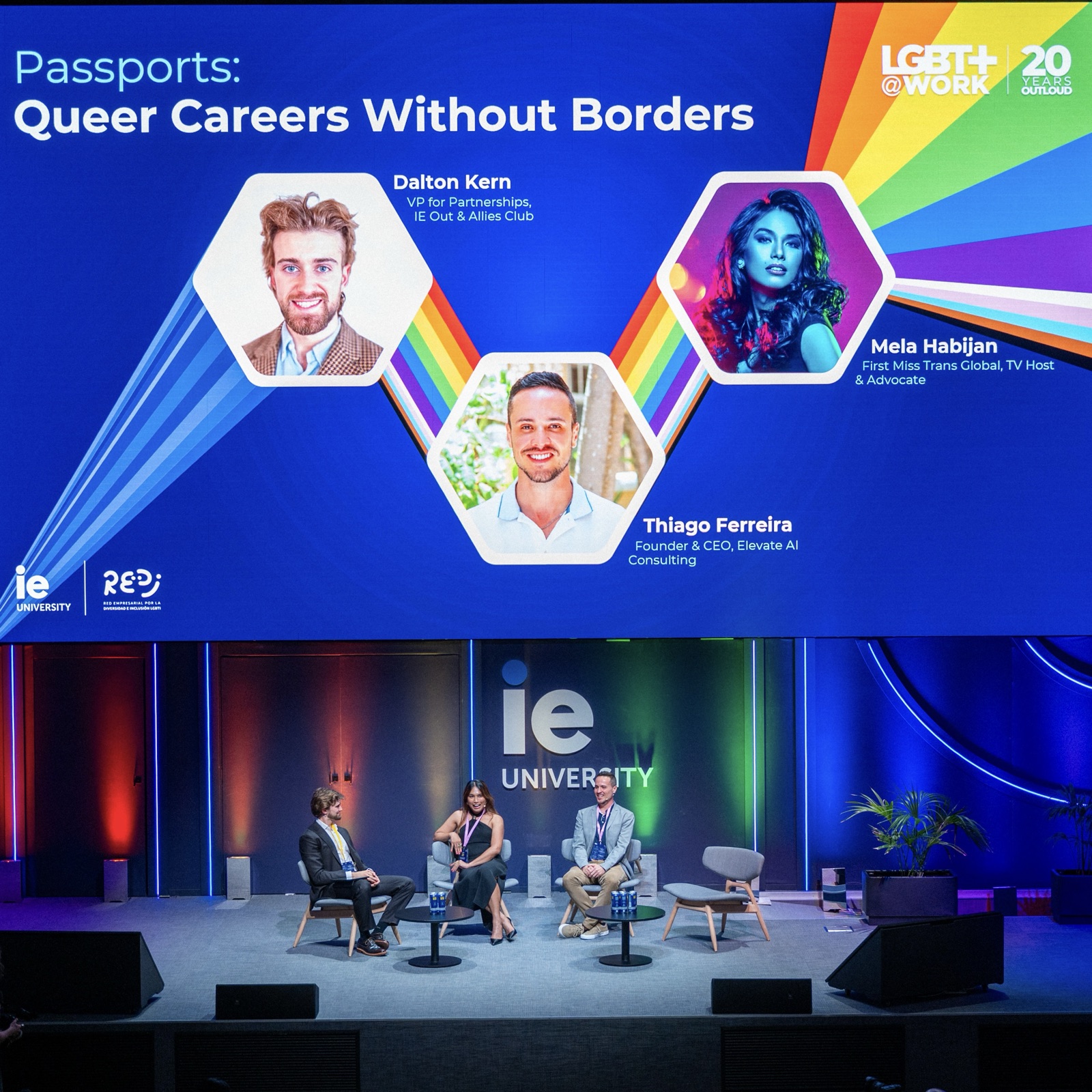 Thiago Ferreira, Mela Habijan, and Dalton Kern on stage during the Passports panel at IE University
