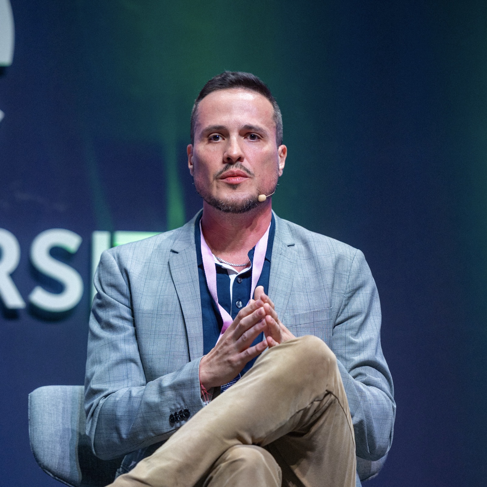 Thiago Ferreira, Founder and CEO of Elevate AI Consulting, on stage at LGBT+@Work 2026